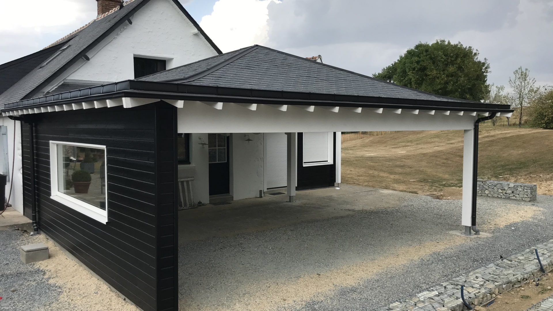 Aménagement extérieur : construction d'un porche en bois - Atelier Bois